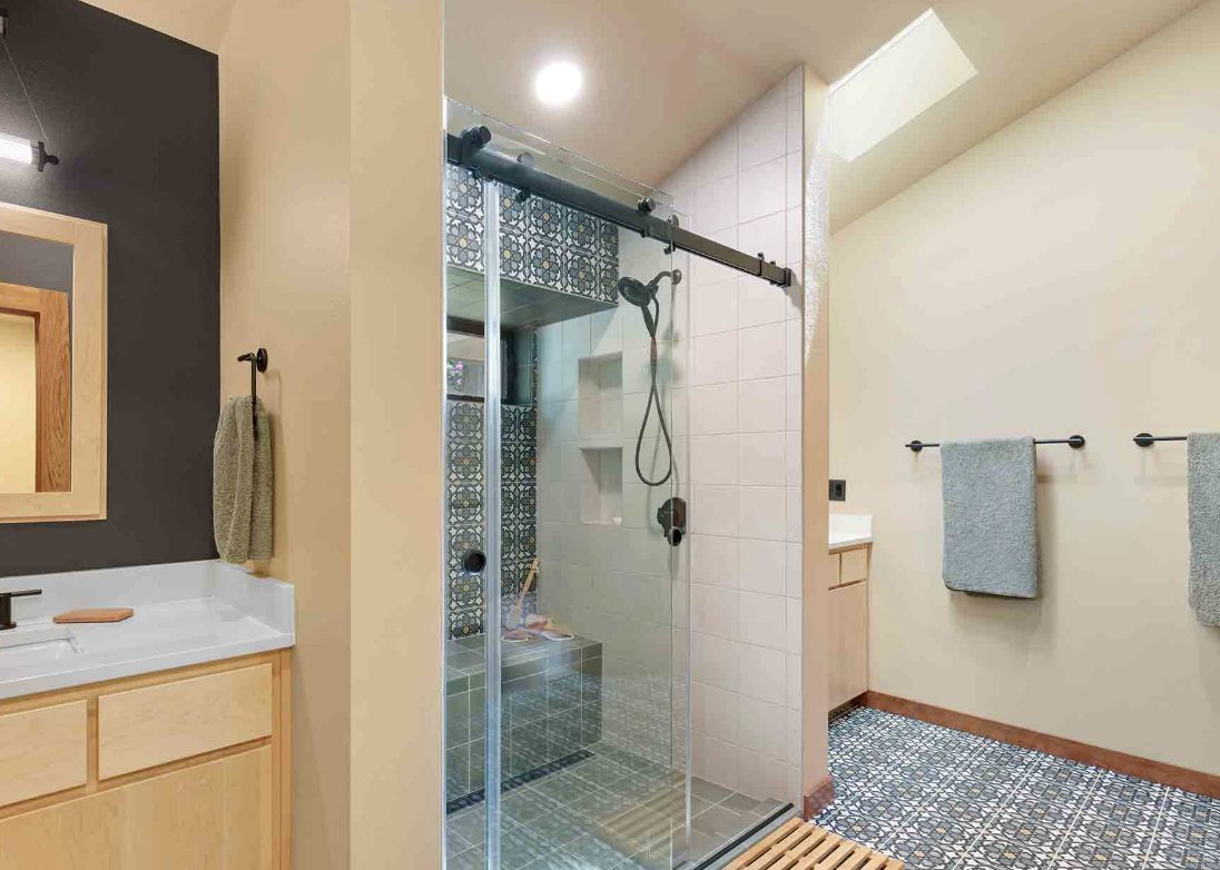 Guest bathroom refresh with sliding glass shower door