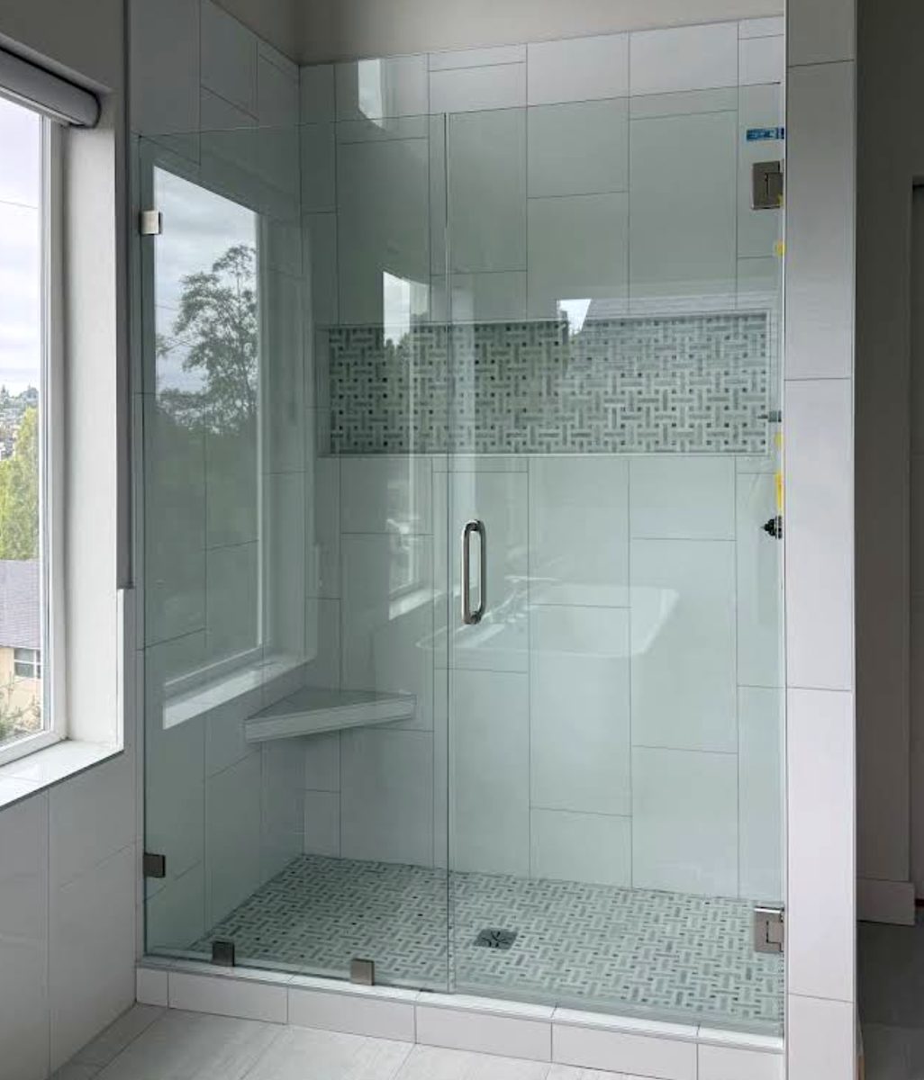 Tile shower with glass enclosure